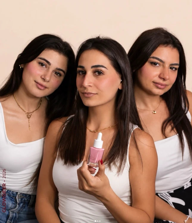 Three girls wearing GlowDeer liquid blush, one holding the pink bottle
